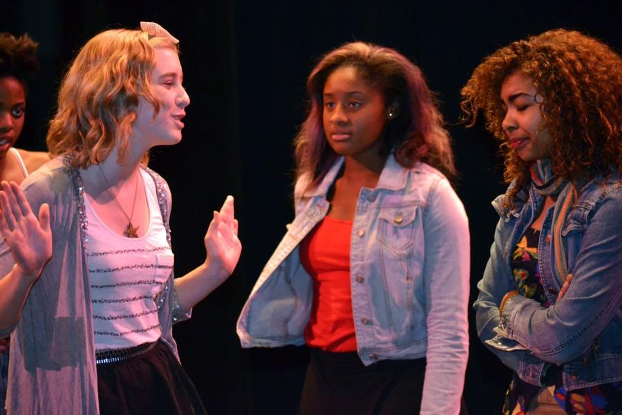 Johanna Hill, Kayanna Wymbs, and Xoe Ohara, all sophomores, act in the fall production Nov. 15.