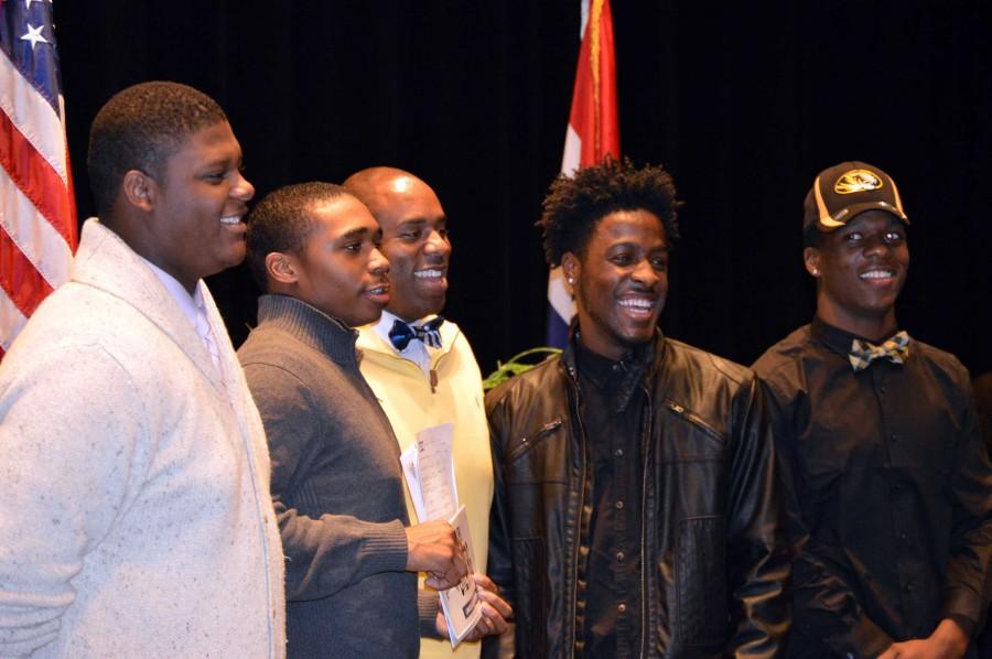 Football players sign with colleges for National Signing Day