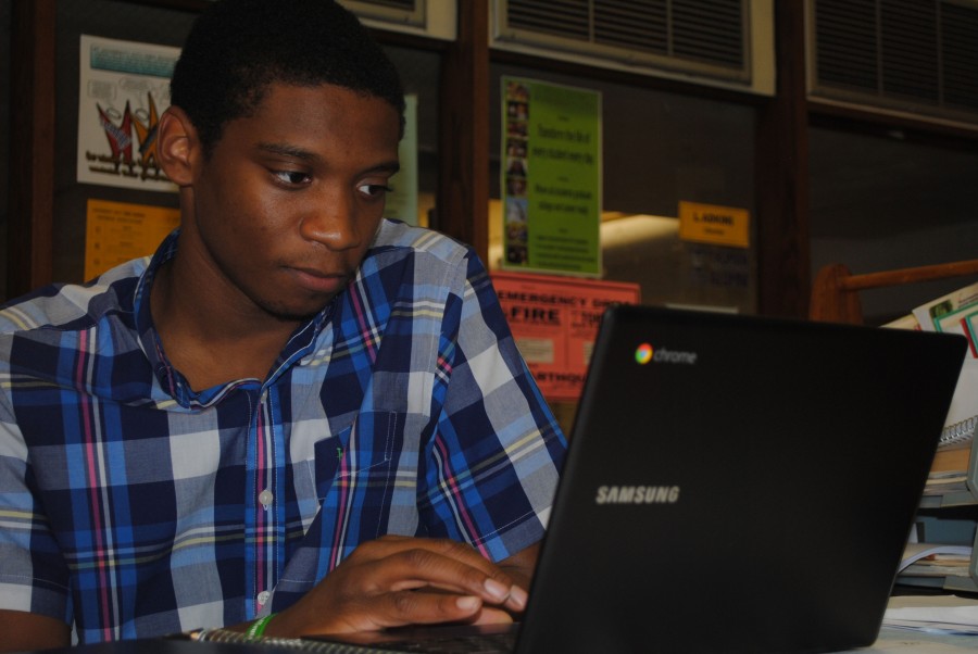 During his American Law independent study, senior Joseph Chunn works in the library. “Having Chromebooks is like a double-edge sword,” said Chunn. “While they do provide much educational utility on the surface, because if they’re lost or damaged, they unfortunately cause a bit of liability. Another challenge is that they invite removal from the educational setting, because now that you’ve integrated this new technology without really setting a groundwork for how it will actually be employed in the classroom, the student is left to determine how they’ll use it, and inevitably that leaves the system to be used for entertainment purposes as opposed to an instrument of learning.”