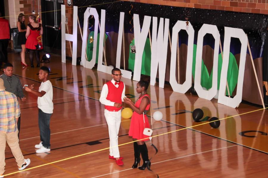 For the second  year in a row, Rontrell Gentry and Taylor Bass, seniors, attented the dance together. “We planned to wear red because it went with the red carpet theme,” Gentry said. “We hadn’t seen each other’s outfits before the dance so we were happy we matched.” The pair went off to the side to take selfies and have time to themselves