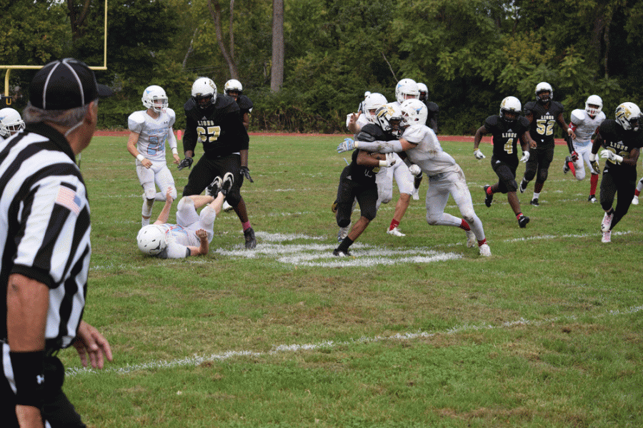 Keeson Taylor, senior wide receiver, makes a run across the 40 yard line for a first down. Taylor felt confident that they could win and that Parkway West a was beatable team. 