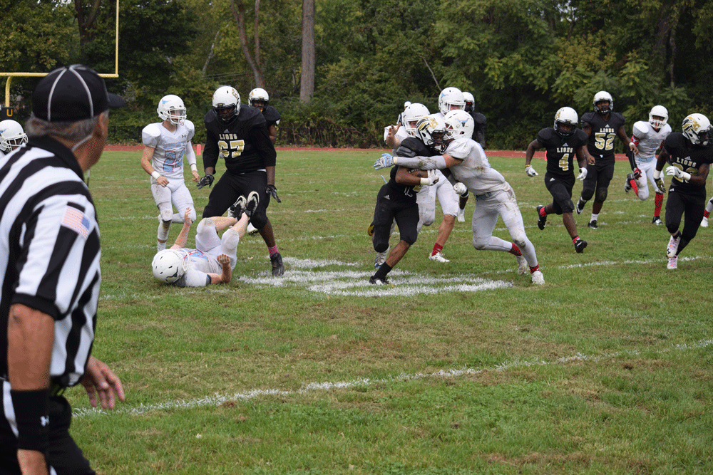 Keeson Taylor, senior wide receiver, makes a run across the 40 yard line for a first down. Taylor felt confident that they could win and that Parkway West a was beatable team.
