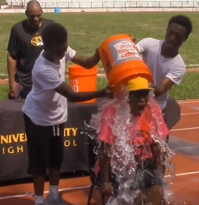 In 2014, Taylor Simpson, freshman, and brother Devon Simpson, junior, participate in the ALS ice bucket challenge by dumping ice water on their grandmother, former superintendent, Dr. Joylynn Pruitt.