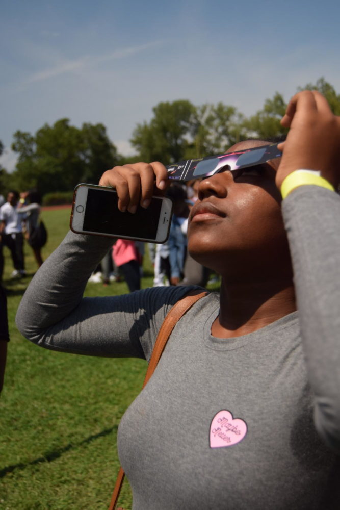 Students view solar eclipse