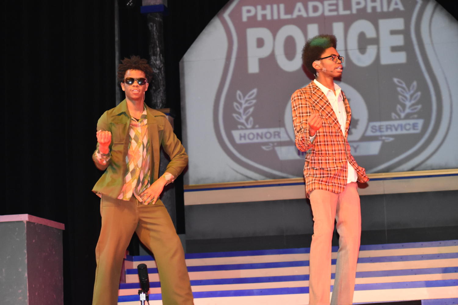 Senior William Austin (left) and junior Marquess Pearson (right) dance along to the beat during the spring musical