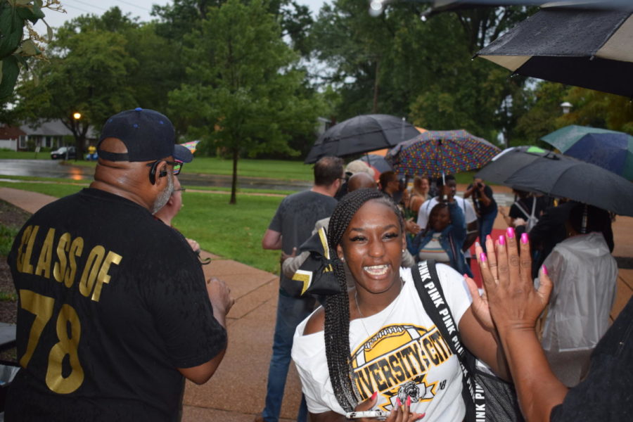 Rain doesnt stop first day of school tradition