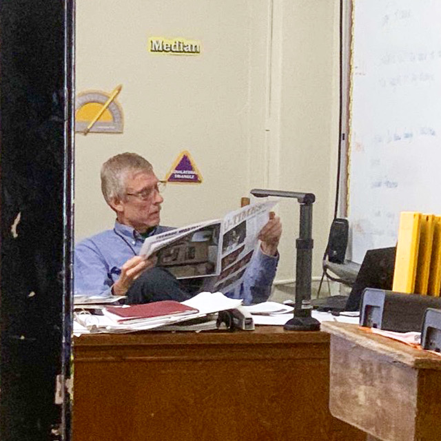 Mr. Ladage enjoys latest issue of U-Times