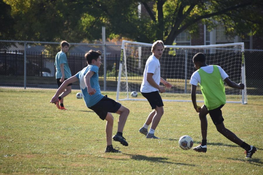 The boys soccer team seen here at one of their first scrimmages of the season. I was very excited to be able to play again because all weve been doing for the past month was conditioning said Nate Martin, senior.  