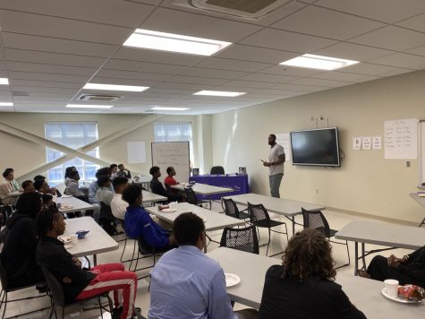 Men of Valor hosts Larry Hughes lunch and learn