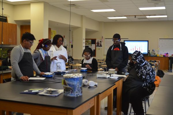 The agriculture class conducts an experiment in class Jan. 9. I had to weigh the mass of an eraser, perky and beaker, Max Rojas, freshman, said. She had us write down what we observed, I really enjoyed this.