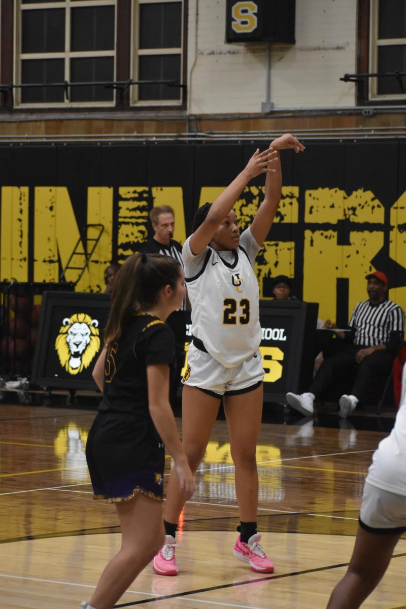 Jayce Green, freshman, shots a free throw in the girls varsity basketball game Dec. 7.